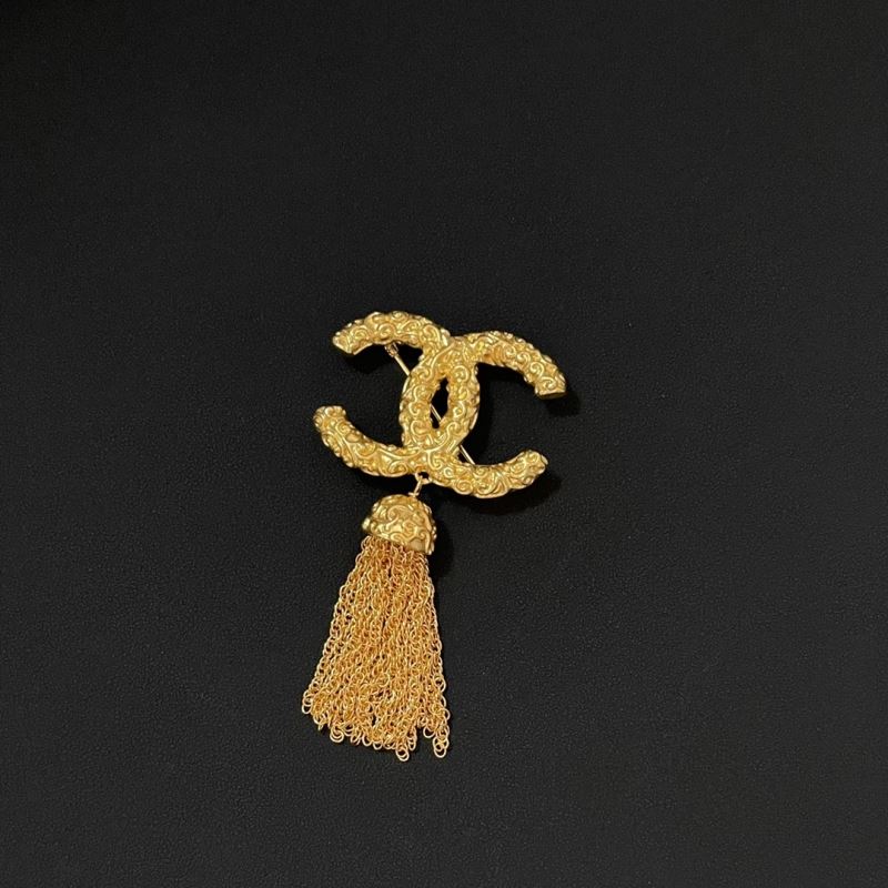 Ch*el brooches